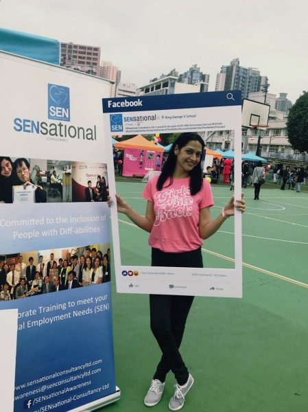 A women students can be seen posing behind the SENsational Facebook post photo frame whilst standing next to the SENsational banner